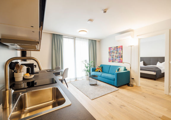 The modern, fully equipped kitchen-living room in the Apartment